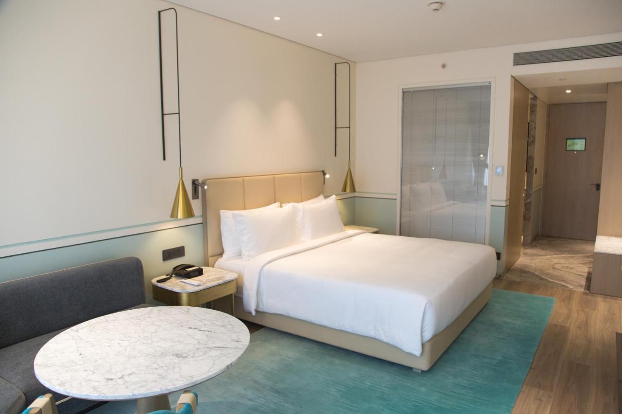 فندق Radisson Blu Mumbai International Airport المظهر الخارجي الصورة A room at the hotel